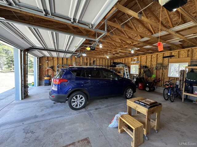 93 E Johnson Lake Rd, Gwinn, MI 49841 - garage with a garage door opener