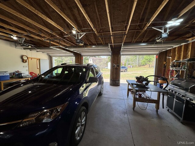 93 E Johnson Lake Rd, Gwinn, MI 49841 - garage with a garage door opener