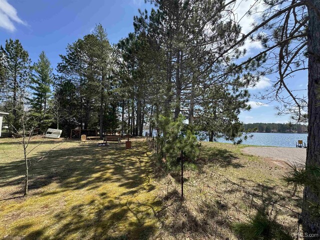 93 E Johnson Lake Rd, Gwinn, MI 49841 - view of yard featuring a water view