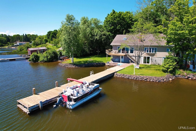 52170 Canal Rd, Houghton, MI 49931 - dock area featuring a water view, a lawn, and stairs
