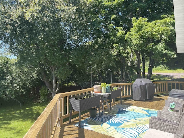 52170 Canal Rd, Houghton, MI 49931 - deck with a grill and view of wooded area