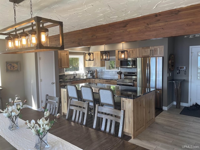 52170 Canal Rd, Houghton, MI 49931 - dining space with light wood-style floors and baseboards