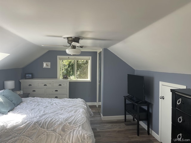 52170 Canal Rd, Houghton, MI 49931 - bedroom featuring dark wood-style flooring, vaulted ceiling, baseboards, and a ceiling fan