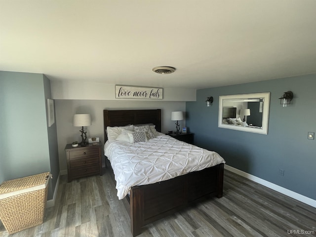 52170 Canal Rd, Houghton, MI 49931 - bedroom featuring wood finished floors and baseboards