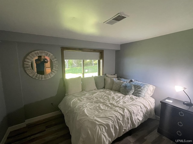 52170 Canal Rd, Houghton, MI 49931 - bedroom featuring wood finished floors and baseboards