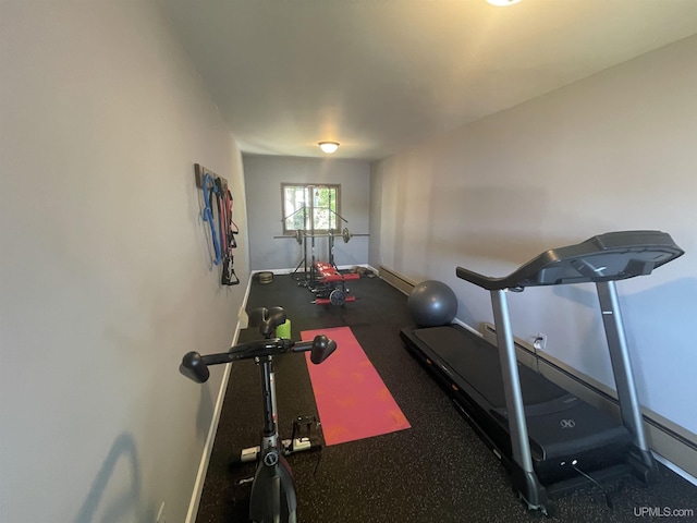 52170 Canal Rd, Houghton, MI 49931 - workout room featuring baseboards and a baseboard heating unit