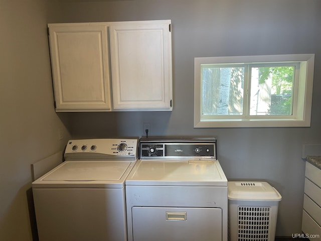 52170 Canal Rd, Houghton, MI 49931 - laundry room with washing machine and clothes dryer and cabinet space