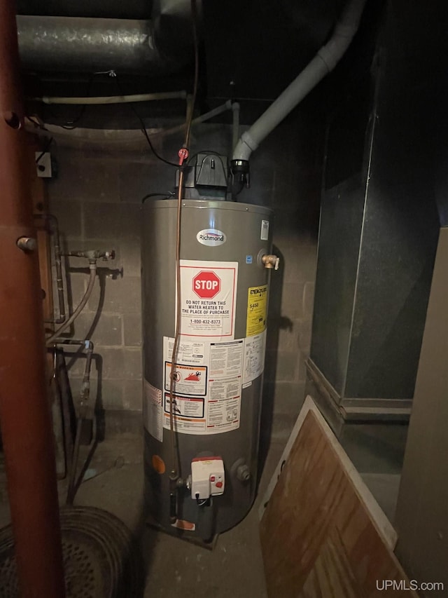 52170 Canal Rd, Houghton, MI 49931 - utility room featuring gas water heater