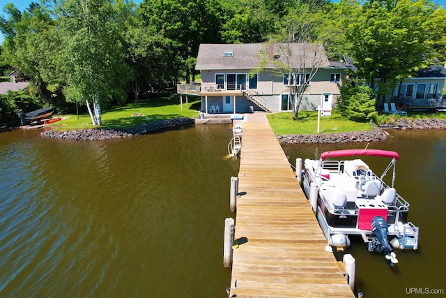 52170 Canal Rd, Houghton, MI 49931 - dock area with a yard, stairs, and a deck with water view