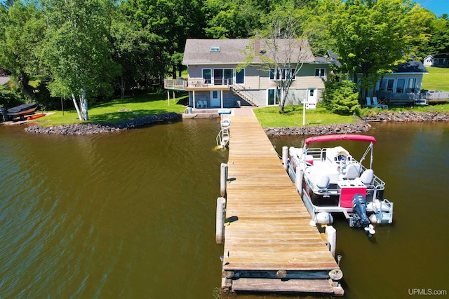 52170 Canal Rd, Houghton, MI 49931 - dock area with a yard, a deck with water view, and stairs