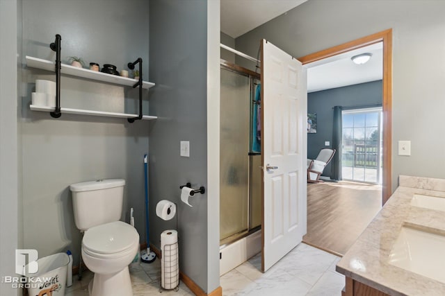 3275 Morrish Rd, Swartz Creek, MI 48473 - bathroom featuring a shower stall, marble finish flooring, toilet, and double vanity