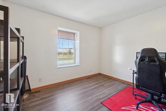 3275 Morrish Rd, Swartz Creek, MI 48473 - workout area featuring wood finished floors and baseboards