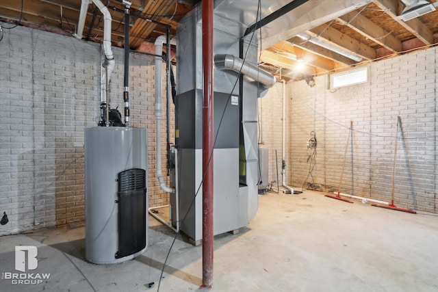 3275 Morrish Rd, Swartz Creek, MI 48473 - unfinished basement with water heater, heating unit, and brick wall