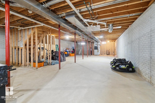 3275 Morrish Rd, Swartz Creek, MI 48473 - unfinished below grade area with brick wall