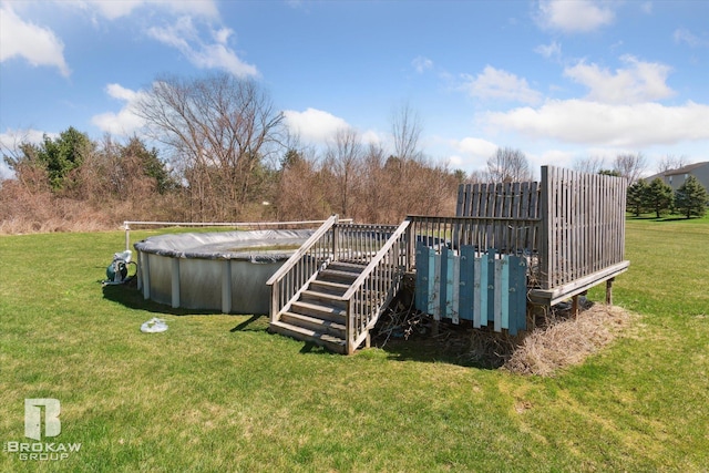 3275 Morrish Rd, Swartz Creek, MI 48473 - view of grassy yard featuring a deck and a covered pool