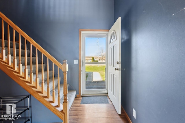 3275 Morrish Rd, Swartz Creek, MI 48473 - entrance foyer with wood finished floors and stairs