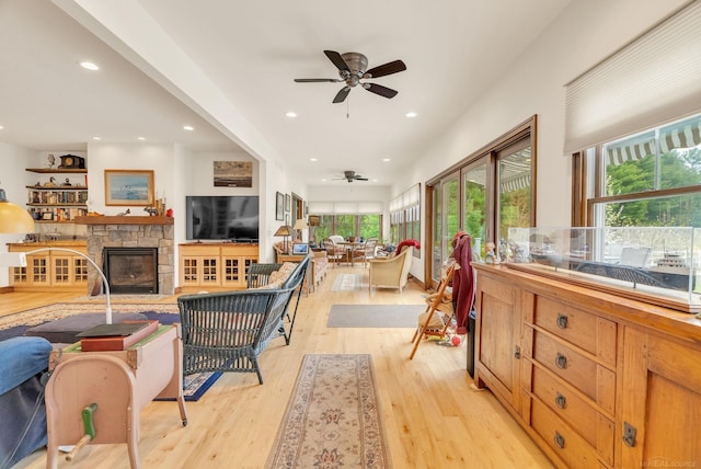 3905 Lakeshore Rd, Lexington, MI 48450 - living area featuring a ceiling fan, light wood finished floors, recessed lighting, and a fireplace