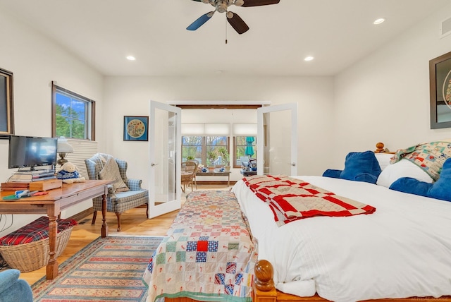 3905 Lakeshore Rd, Lexington, MI 48450 - bedroom with french doors, recessed lighting, light wood-style floors, and a ceiling fan