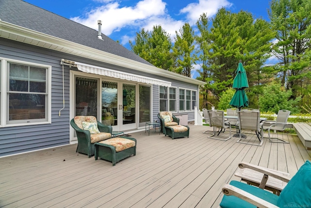 3905 Lakeshore Rd, Lexington, MI 48450 - wooden terrace featuring french doors and outdoor dining area