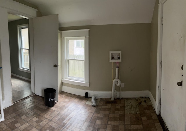 1106 Marsac St, Bay City, MI 48708 - washroom featuring washer hookup, brick patterned floors, and baseboards