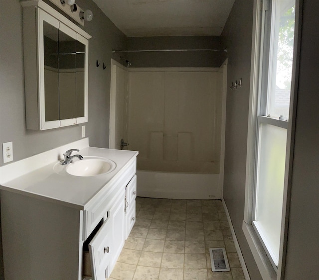 1106 Marsac St, Bay City, MI 48708 - full bath featuring vanity and  shower combination