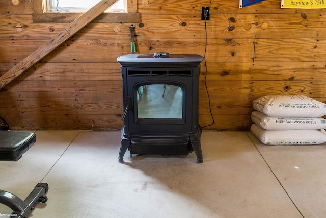 6138 River Rd, East China, MI 48054 - detailed view of a wood stove and finished concrete flooring