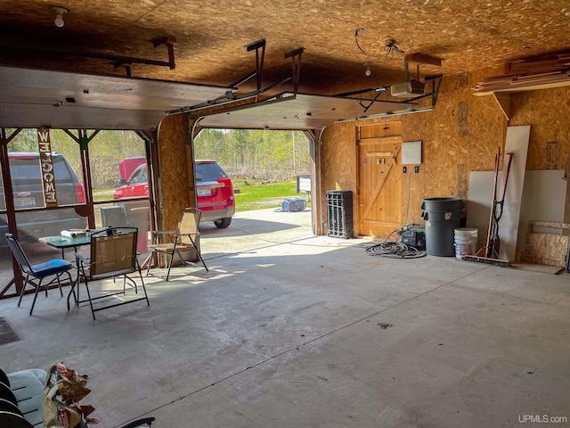16477 Cc.25 Ln, Wetmore, MI 49895 - garage with a garage door opener