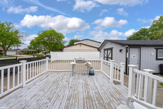 37601 Dartmouth Dr, Sterling Heights, MI 48310 - wooden deck featuring an outbuilding