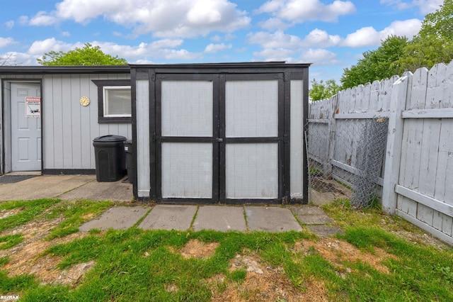 37601 Dartmouth Dr, Sterling Heights, MI 48310 - view of shed with a fenced backyard