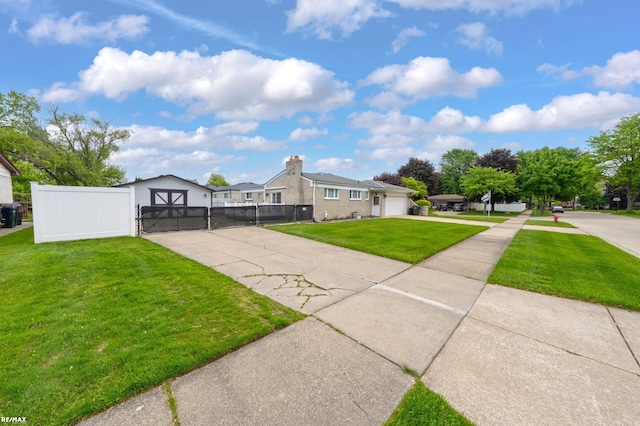 37601 Dartmouth Dr, Sterling Heights, MI 48310 - view of front of property with an outbuilding, a chimney, brick siding, concrete driveway, and a garage