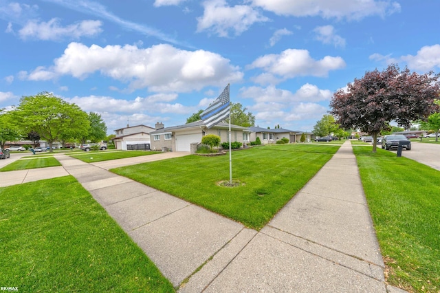 37601 Dartmouth Dr, Sterling Heights, MI 48310 - view of front facade with an attached garage, a front lawn, and concrete driveway