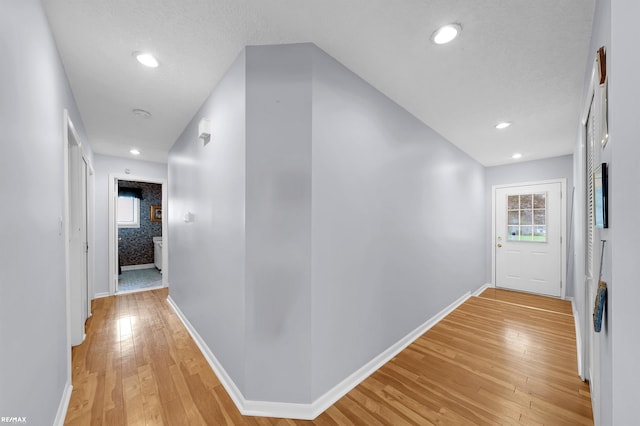 37601 Dartmouth Dr, Sterling Heights, MI 48310 - hall featuring baseboards, light wood finished floors, and recessed lighting