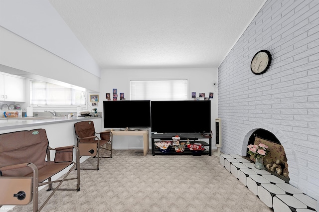 37601 Dartmouth Dr, Sterling Heights, MI 48310 - living area with lofted ceiling, healthy amount of natural light, a textured ceiling, and light carpet