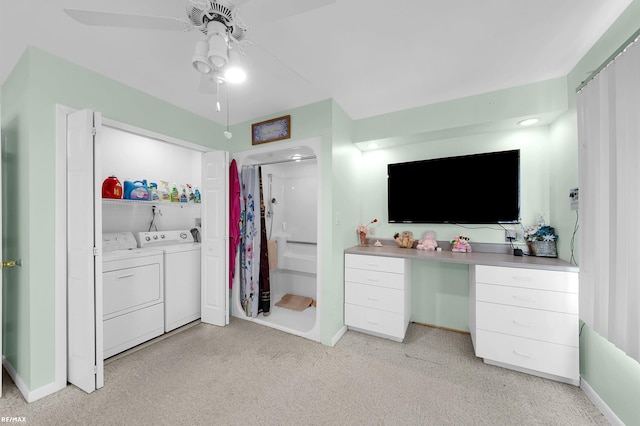 37601 Dartmouth Dr, Sterling Heights, MI 48310 - bedroom featuring washer and dryer, baseboards, light carpet, and ceiling fan