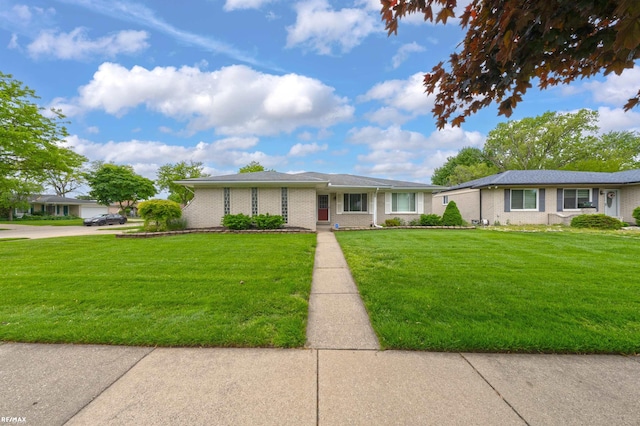 37601 Dartmouth Dr, Sterling Heights, MI 48310 - single story home with a front yard and brick siding