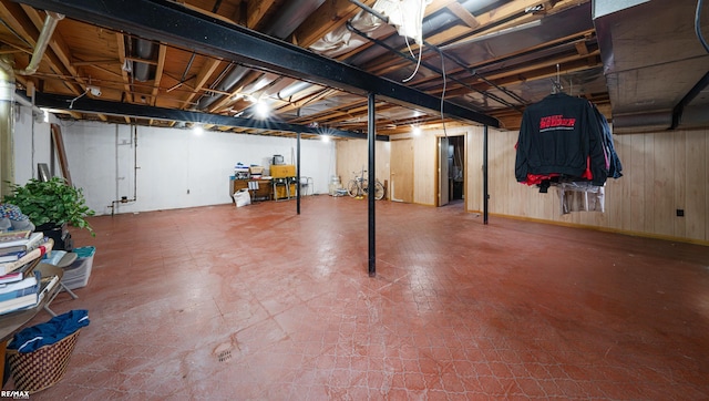 37601 Dartmouth Dr, Sterling Heights, MI 48310 - unfinished basement featuring tile patterned floors and wooden walls