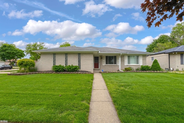 37601 Dartmouth Dr, Sterling Heights, MI 48310 - view of front of house with brick siding and a front lawn