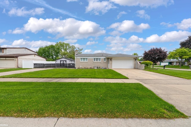 37601 Dartmouth Dr, Sterling Heights, MI 48310 - ranch-style house featuring concrete driveway, a chimney, an attached garage, and brick siding
