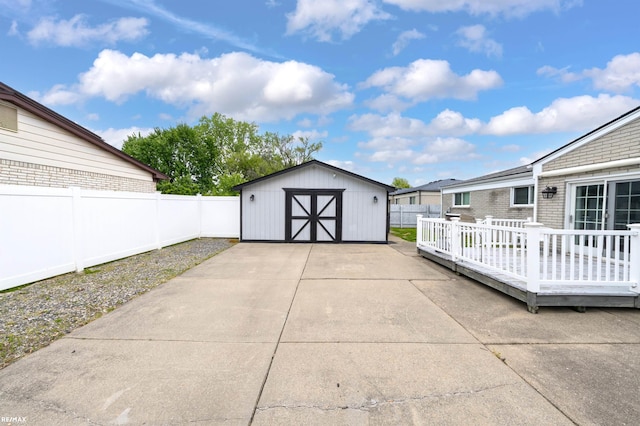 37601 Dartmouth Dr, Sterling Heights, MI 48310 - fenced backyard featuring a wooden deck and a patio
