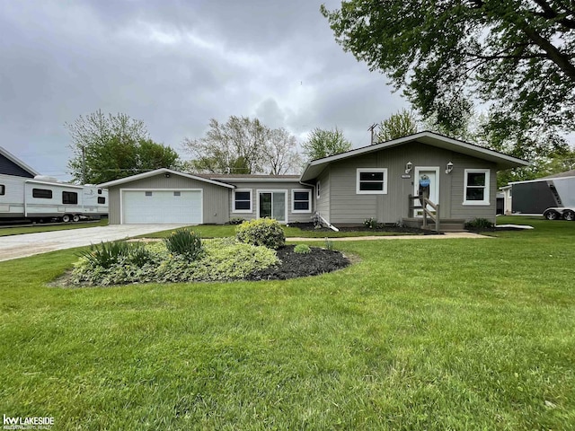 7314 Aspen Rd, Lexington, MI 48450 - ranch-style house with driveway, a garage, and a front lawn