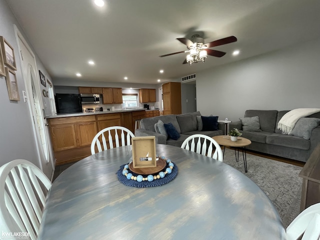 7314 Aspen Rd, Lexington, MI 48450 - dining area featuring a ceiling fan and recessed lighting