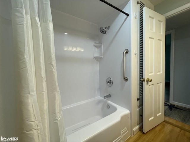 7314 Aspen Rd, Lexington, MI 48450 - bathroom with wood finished floors and shower / tub combo