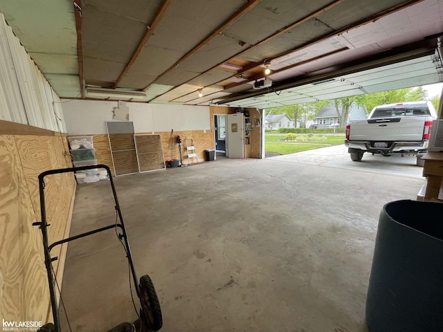 7314 Aspen Rd, Lexington, MI 48450 - garage with a garage door opener