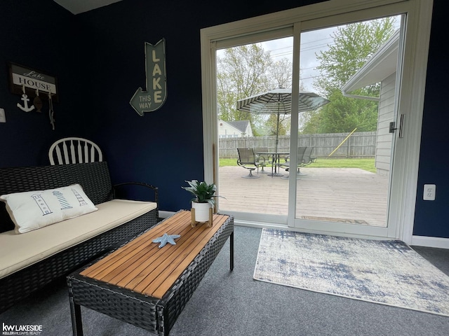 7314 Aspen Rd, Lexington, MI 48450 - carpeted living area with baseboards