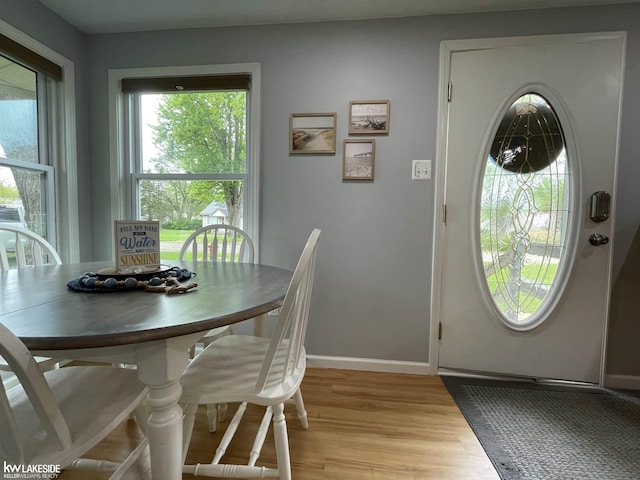 7314 Aspen Rd, Lexington, MI 48450 - dining room featuring light wood-type flooring and baseboards