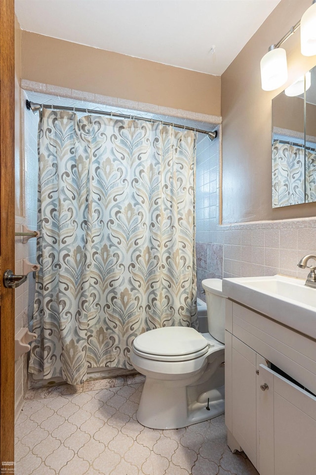 21036 Suffolk St, Clinton Township, MI 48035 - bathroom with toilet, tile walls, shower / bath combination with curtain, and vanity