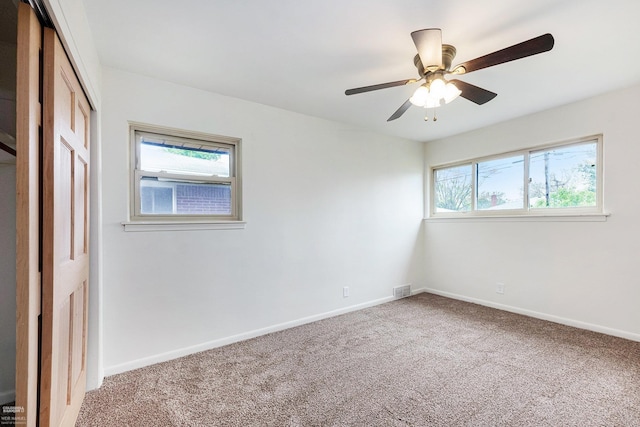 21036 Suffolk St, Clinton Township, MI 48035 - unfurnished bedroom featuring a closet, carpet, baseboards, and ceiling fan