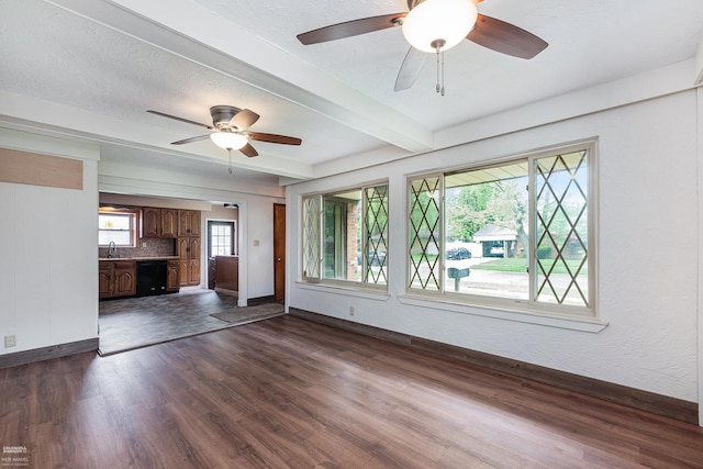 21036 Suffolk St, Clinton Township, MI 48035 - unfurnished living room with baseboards, a ceiling fan, a sink, dark wood-type flooring, and beamed ceiling