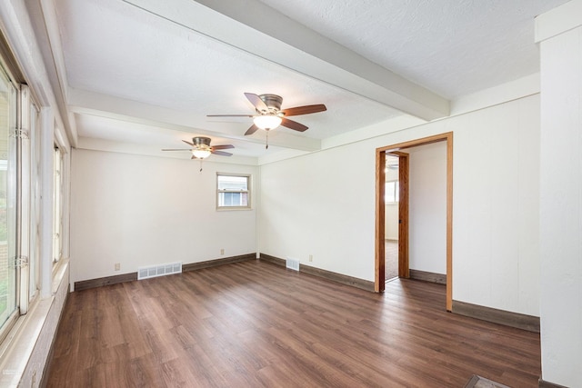 21036 Suffolk St, Clinton Township, MI 48035 - spare room with beamed ceiling, ceiling fan, wood finished floors, and baseboards