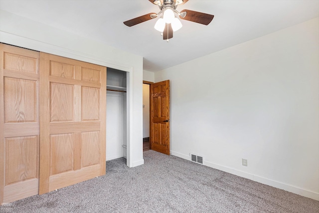 21036 Suffolk St, Clinton Township, MI 48035 - unfurnished bedroom with carpet, baseboards, a closet, and a ceiling fan